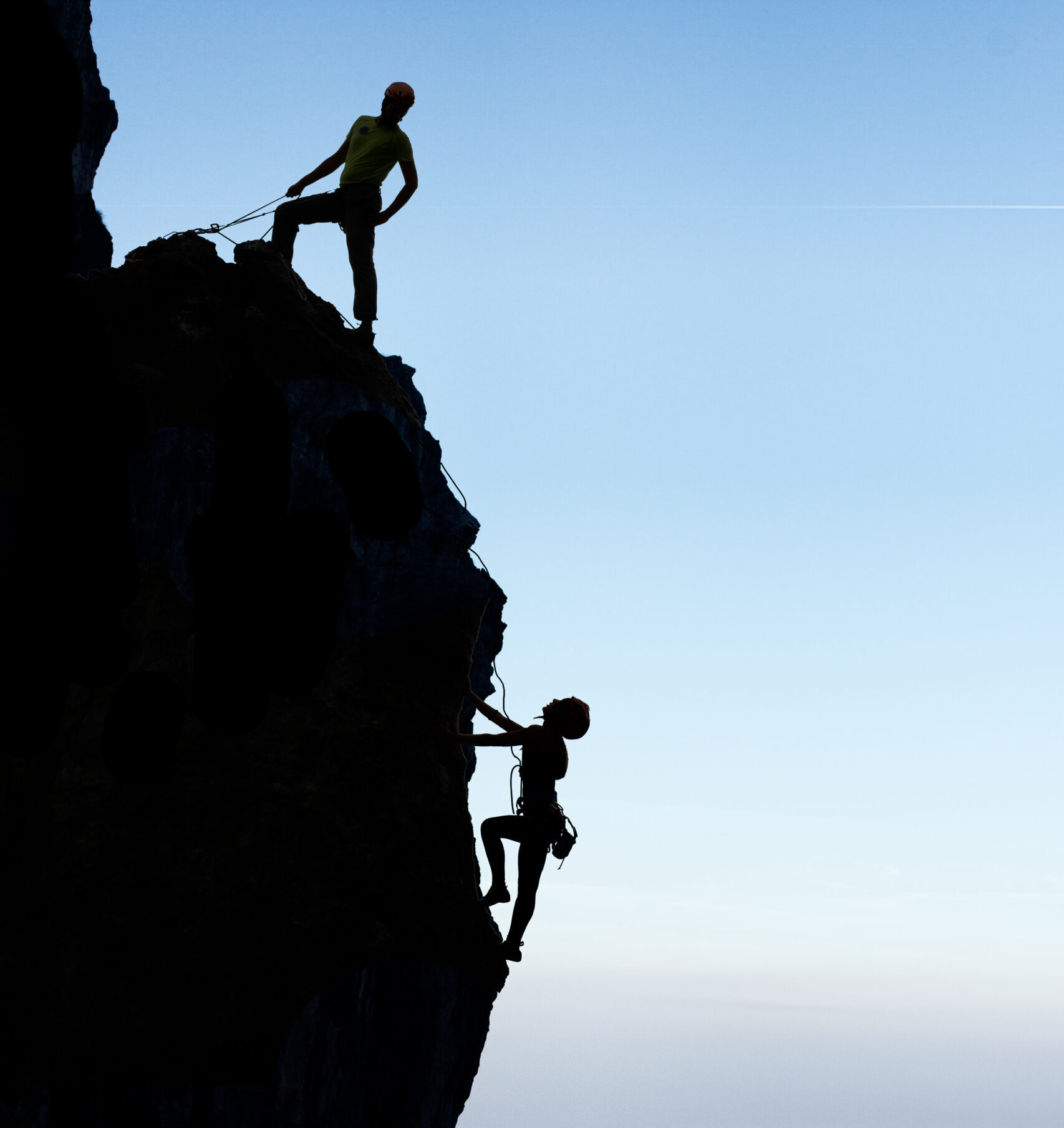 Teamwork couple climbers